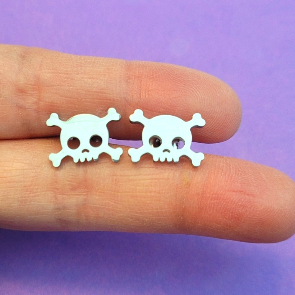 Unique, trendy, punk, skull shaped silver stainless steel stud earrings